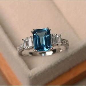 Silver plated Blue crystal emerald cut ring size 9